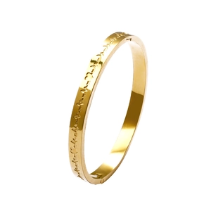 Minimalist gold stainless steel bangle featuring an engraved heartbeat EKG pattern