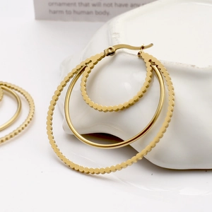 Chic triple-layered gold titanium steel hoop earrings with polished and textured finishes