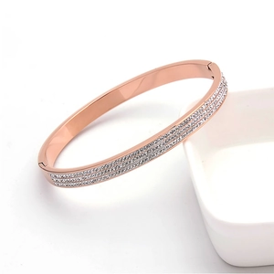 Elegant rose gold titanium steel bracelet with three rows of sparkling crystal stones