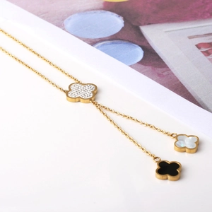 Titanium stalen klaver ketting met kristallen en kwastjes in luxe 18k goud verguldsel