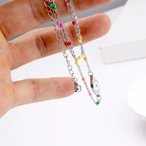 Bohemian Evil Eye Fußkettchen mit bunten Perlen und Glöckchen an Silberkette