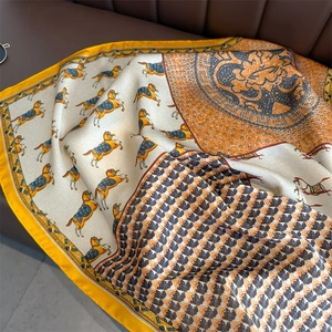 Detailed view of horse print silk scarf featuring retro patterns and orange borders