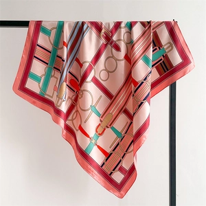 Pink satin square scarf featuring vintage equestrian harness and metal chain prints