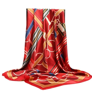Vintage red silk scarf with classic geometric horsebit and gold chain print pattern