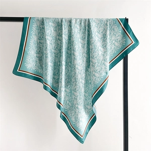 Teal satin paisley square scarf for women with elegant brown border and hanging drape