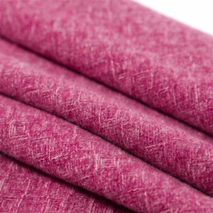 Detail of rose red cashmere feel scarf showing thick diamond weave and soft texture