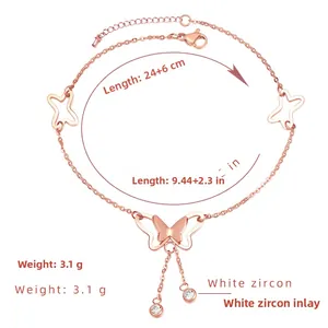 Detail der 18K Roségold Schmetterling Fußkette mit Maßen 24+6cm und weißen Zirkonia-Quasten