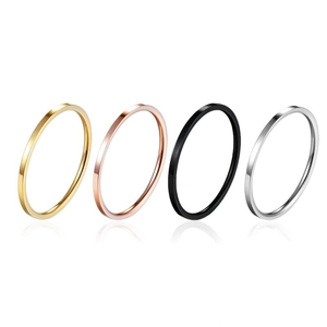 Minimalist 2mm titanium steel ring set in gold, rose gold, black, and silver finishes