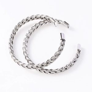 Detailed close-up showing the intricate silver braided wire texture of the C-shape cuff bracelet