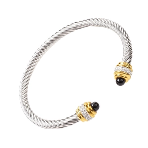 Twisted cable titanium steel bangle with gold-tone pave-set diamond rings and black beads