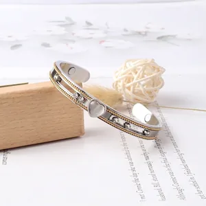 Two-tone magnetic health bracelet with cat eye heart charm and clear crystal stones