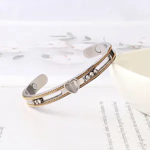 Titanium magnetic therapy heart bracelet with cat eye stone and silver gold-tone finish