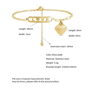 Bracelet coeur en acier titane doré avec pendentif LOVE ajouré et pampille
