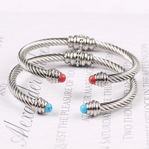 Silver twisted cable cuff bracelet set with red agate and turquoise beads accents