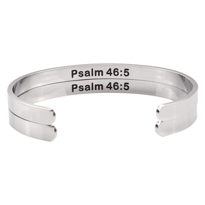 Silver stainless steel cuff bracelet set with Psalm 46:5 religious engraving on a white background