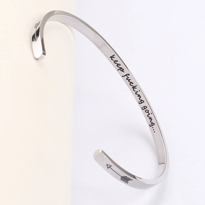 Polished stainless steel inspirational open cuff bracelet with motivational engraving
