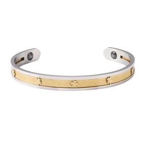 C-shaped magnetic therapy bracelet in silver and gold steel with clover design