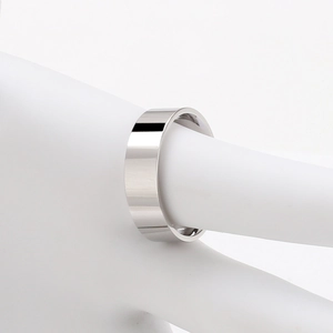 Macro detail of 6mm polished stainless steel ring with smooth silver mirror finish
