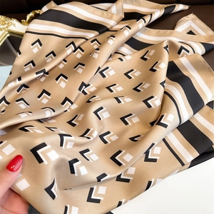 Champagne gold 90cm square silk scarf with black geometric L-patterns and striped borders
