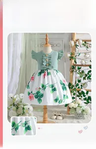 Close-up of green ribbed bodice with wooden buttons and floral print dress skirt