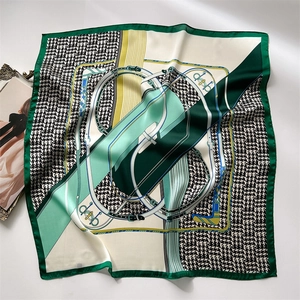 Green and white equestrian pattern silk scarf with houndstooth print and vintage frames