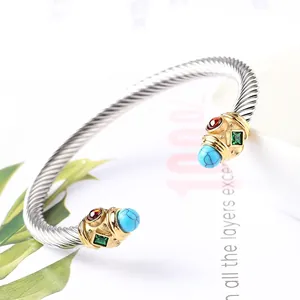 Bracelet câble argenté bicolore avec embouts dorés et pierres précieuses colorées