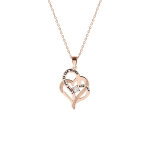Collana a cuore oro rosa con incisione I love you to the moon and back e cristallo lucido