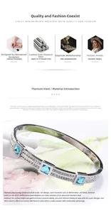 Macro shot of silver titanium steel bangle with blue square crystals and pavé diamonds
