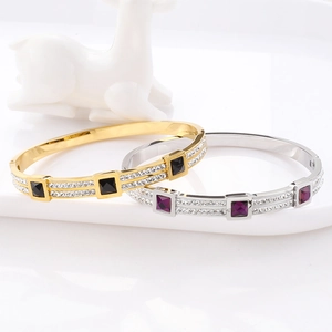 Titanium steel bangles with square crystals and pavé diamonds in gold and silver finishes