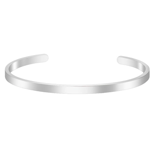 Close-up of a minimalist silver stainless steel cuff bracelet with mirror-polished finish