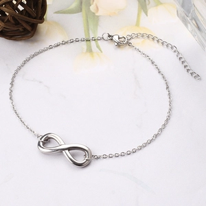 Detailed view of silver infinity charm anklet with lobster clasp and extension chain