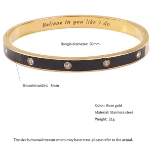 Bracelet en acier rose doré avec émail noir, zircons et diamètre de 60 mm