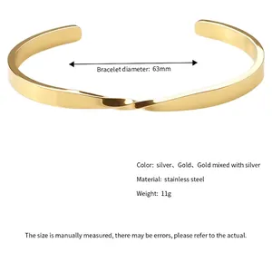 Golden 18K gold-plated stainless steel Mobius twist cuff bracelet with 63mm diameter