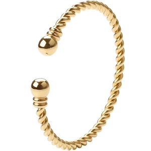 Detailed shot of gold-plated twisted cable cuff bracelet with smooth ball terminals