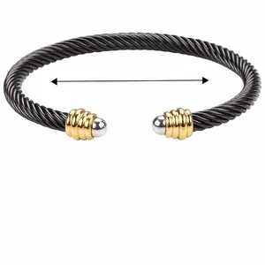 Detail showing 56mm diameter and 17g weight of black stainless steel cable cuff bracelet