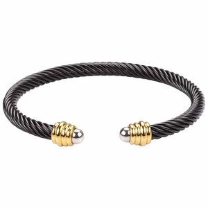 Adjustable black cable wire bangle with gold and silver accents in stainless steel