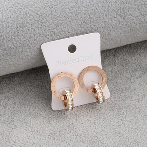 Rose gold stainless steel double hoop earrings with Roman numerals and pavé diamonds