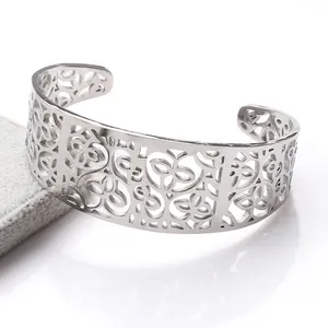 Adjustable hollow flower stainless steel cuff bracelet with silver floral patterns