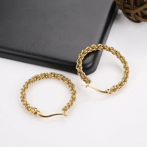 Elegant 18k gold braided hoop earrings for women with a twisted texture and sleek finish