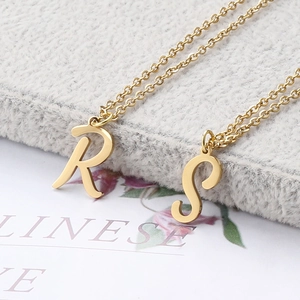 Minimalist gold stainless steel initial necklaces featuring R and S letter pendants