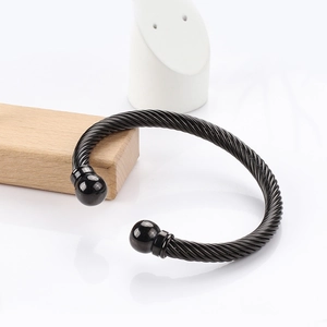 Black twisted cable stainless steel cuff bracelet with polished spherical end caps