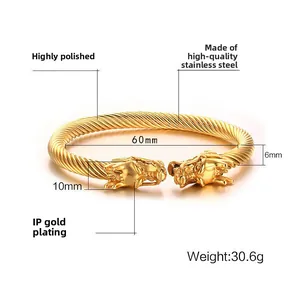 Bracciale a cavo ritorto in acciaio inossidabile dorato con teste di drago rifinite