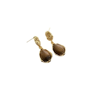 Vintage gold tiger eye stone drop earrings with textured finish for a retro chic look