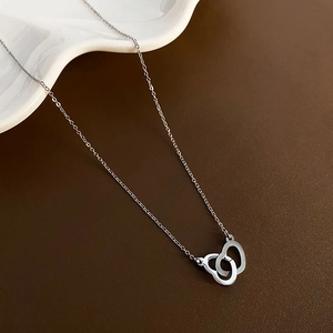Elegant silver interlocking heart and circle titanium steel necklace on leather base