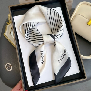 Elegant black and white maze print silk scarf with FLOWER lettering and luxury gift box