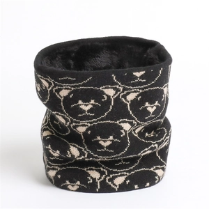 Detail showing plush black fleece lining and bear pattern knit snood for winter warmth
