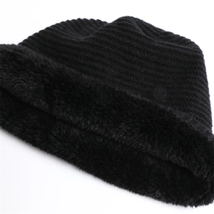 Close-up of black knitted beanie showing thick fleece lining for cold weather warmth
