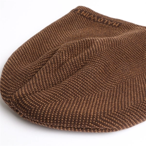 Close-up of herringbone knit texture on the warm beanie with HALOMINT lettering