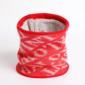 Close-up of red knit scarf showing soft grey fleece lining for winter warmth