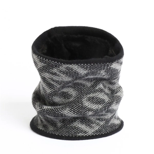 Detail view of winter knitted neck gaiter featuring thick black fleece lining for warmth